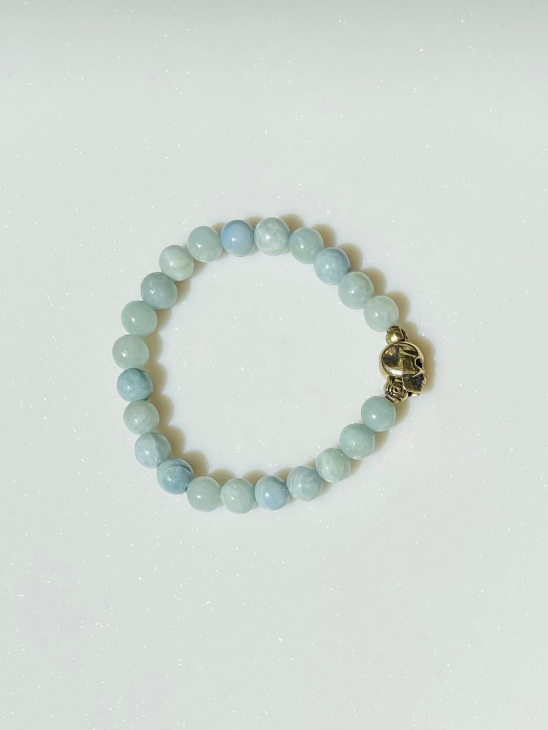 Elite Calming Chalcedony w/gold skull Bacelet